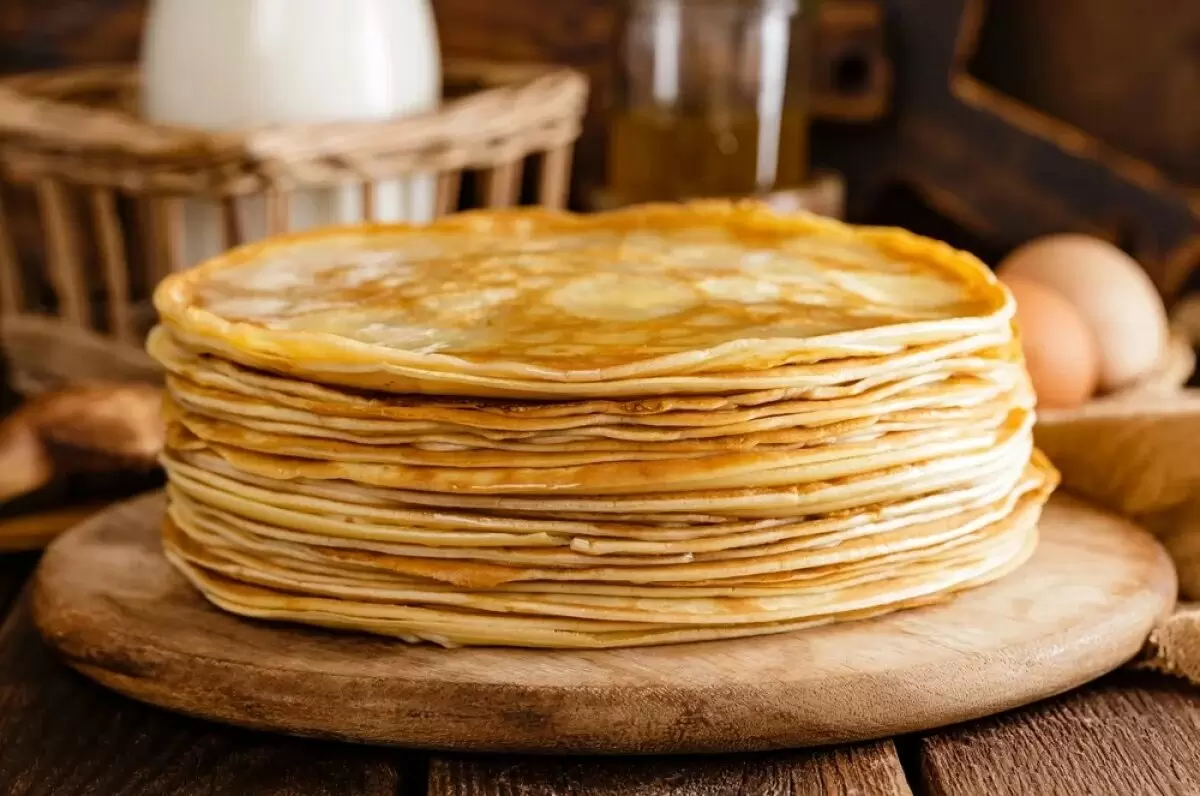 Как жарить блины на Масленицу: секреты идеального теста и процесса